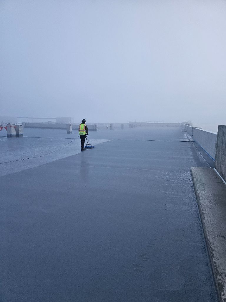 ELD Solutions technician on rooftop membrane testing in California
