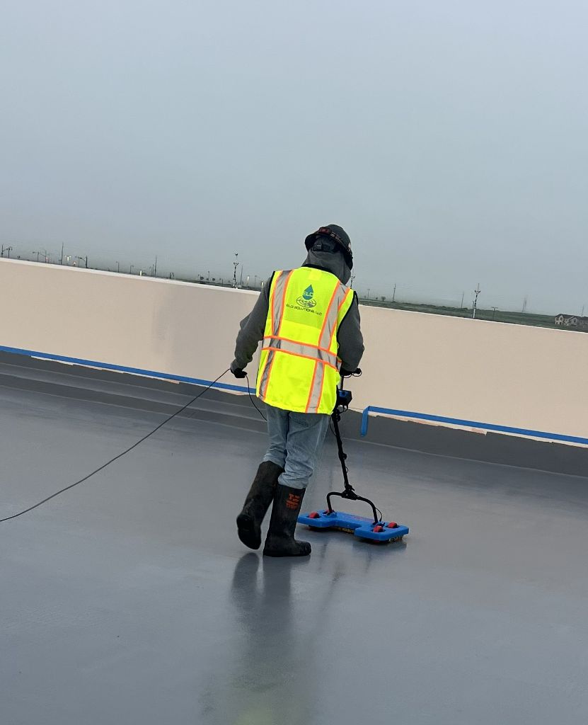 ELD Solutions technician in branded PPE performing leak detection