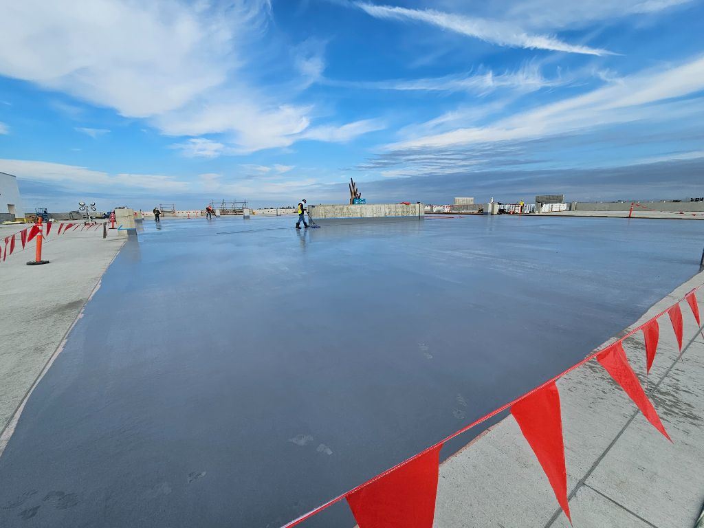 ELD Solutions team performing electronic leak detection on large commercial rooftop